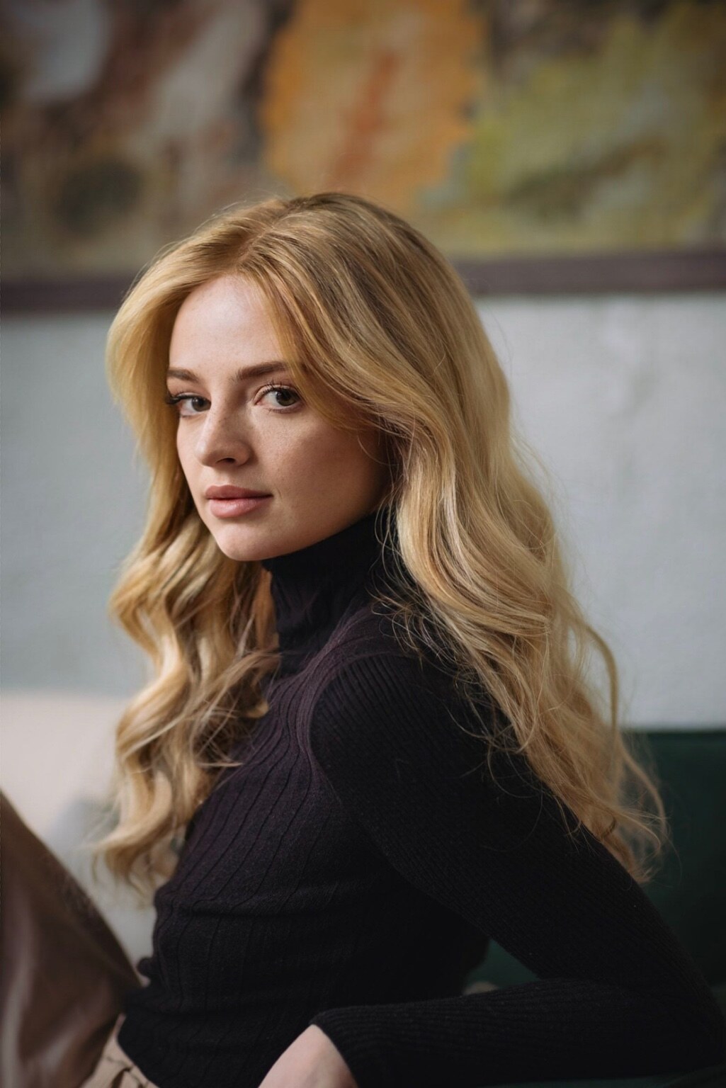 Portrait of Madison Campbell wearing a black turtleneck