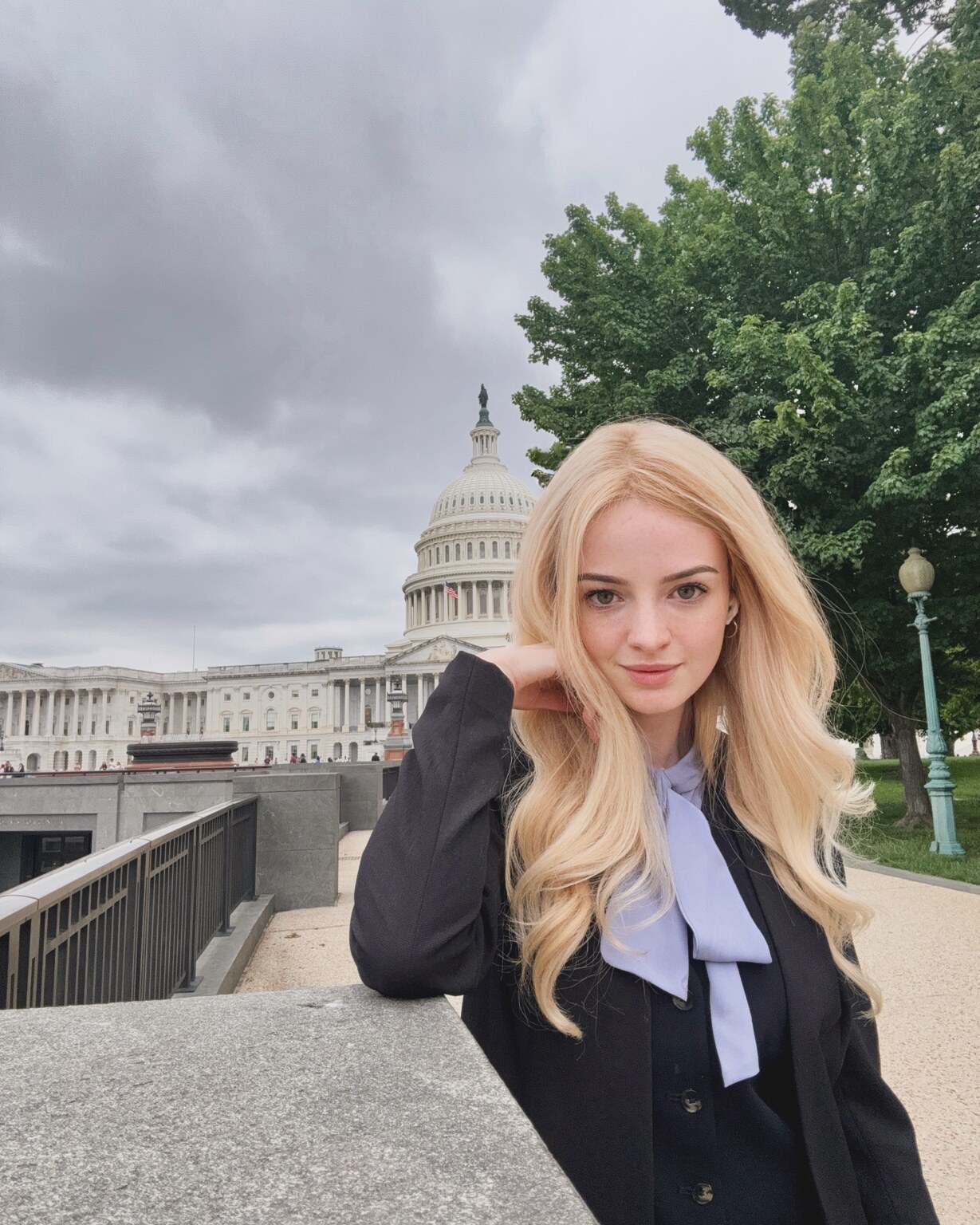 Madison Campbell outside the U.S. Capitol wearing a black blazer and lavender blouse