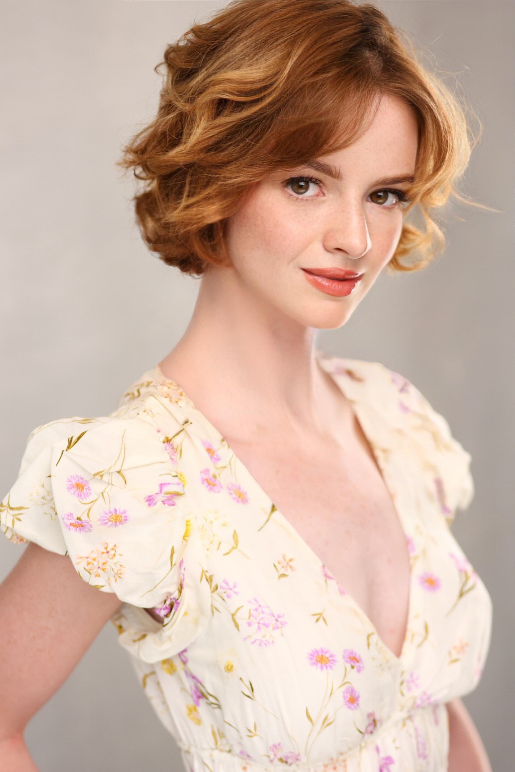 Studio portrait of Madison Campbell wearing a floral dress
